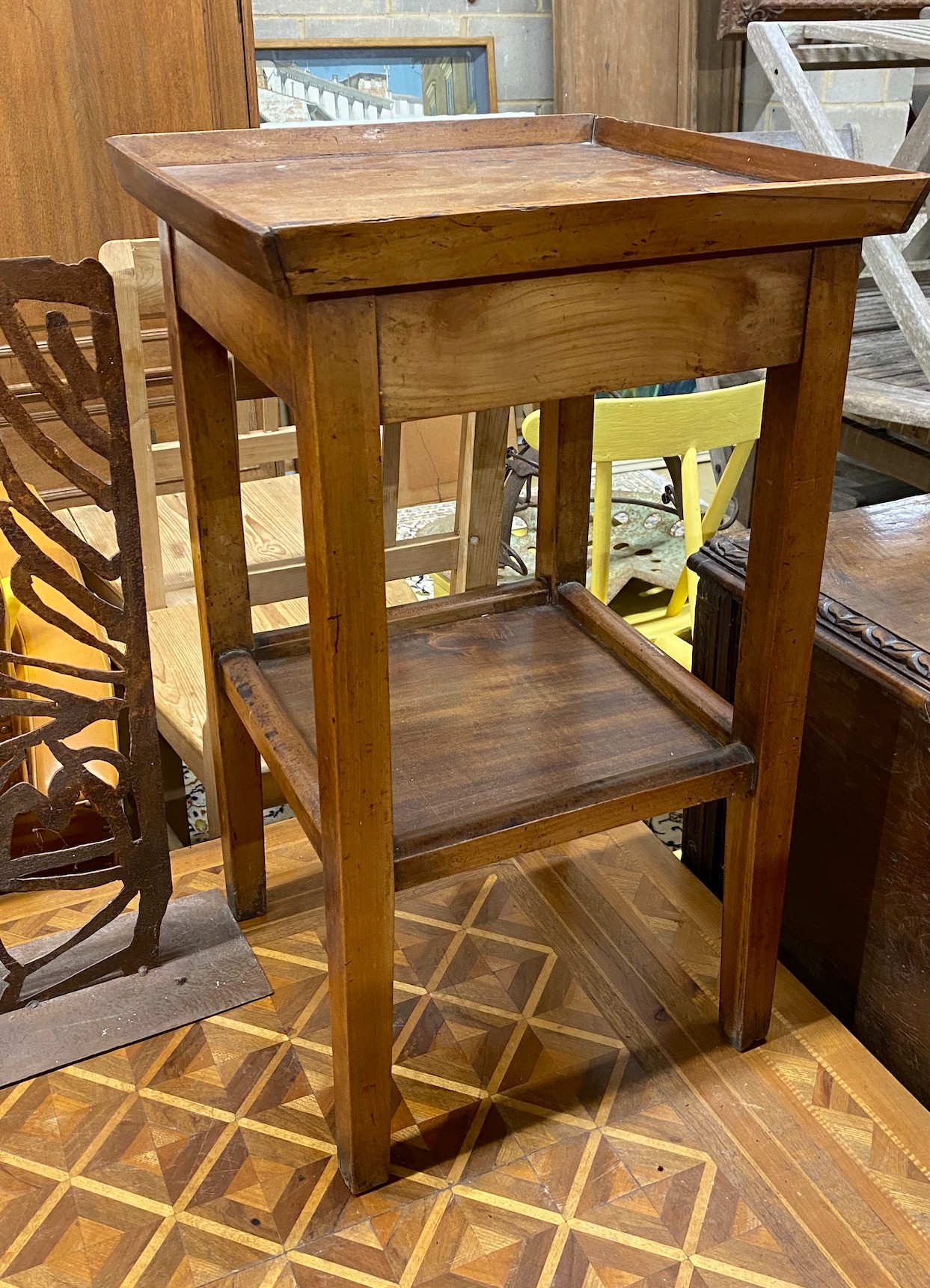 A provincial fruitwood square two tier table, 42cm, height 72cm